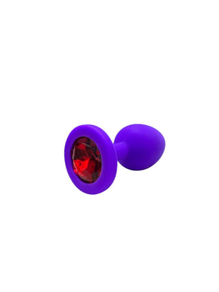 PLUG ANAL DE SILICONA MORADO CON JOYA ROJA TALLA S